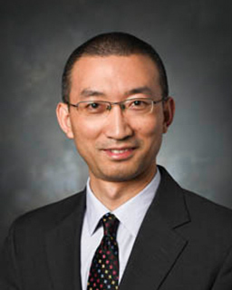 xiaogang hu headshot